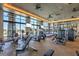 Well-equipped gym featuring modern exercise machines, large windows, and ample natural light for an invigorating workout experience at 9928 Regency Square Ave, Las Vegas, NV 89148