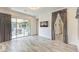 Open living space featuring tile floors, recessed lighting, and sliding glass doors to the patio at 9928 Regency Square Ave, Las Vegas, NV 89148