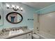 Bathroom featuring vanity, sink and shower-tub combo at 1575 W Warm Springs Rd # 413, Henderson, NV 89014
