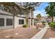 Apartment building featuring well-kept desert landscaping and convenient walkway to units at 1575 W Warm Springs Rd # 413, Henderson, NV 89014