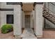 Apartment entryway, featuring a secure gate and nearby stairs to other units for convenience at 1575 W Warm Springs Rd # 413, Henderson, NV 89014