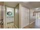 Hallway with linen cabinet, closet and view into bathroom at 1575 W Warm Springs Rd # 413, Henderson, NV 89014