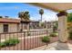 View of the pool area from a balcony, showcasing community amenities and outdoor space at 1575 W Warm Springs Rd # 413, Henderson, NV 89014