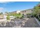 Spacious backyard featuring a pool, mature landscaping, and ample room for outdoor activities at 1604 Danielle Rebecca Ave, North Las Vegas, NV 89086