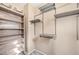 Walk-in closet featuring custom shelving for ample storage space at 1604 Danielle Rebecca Ave, North Las Vegas, NV 89086