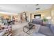 Spacious living room featuring a cozy seating area and staircase at 1604 Danielle Rebecca Ave, North Las Vegas, NV 89086