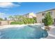 Sparkling pool featuring meticulously landscaped surroundings that create a private backyard oasis at 1604 Danielle Rebecca Ave, North Las Vegas, NV 89086