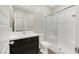 Bathroom features a walk-in shower with glass door and a modern vanity at 234 Polaris Ridge Ave, Henderson, NV 89011