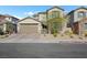 Beautiful two-story home with well-manicured landscaping at 234 Polaris Ridge Ave, Henderson, NV 89011