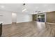 Open-concept living room with wood floors and lots of natural light at 234 Polaris Ridge Ave, Henderson, NV 89011