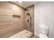 Modern bathroom featuring a tiled shower with a rainfall showerhead and built-in niche at 2606 S Durango Dr # 117, Las Vegas, NV 89117