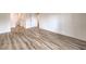 Bedroom with light gray flooring, neutral paint, and access to bathroom and closets at 2606 S Durango Dr # 117, Las Vegas, NV 89117