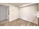 Bright bedroom features light gray flooring and neutral paint ready for new occupants at 2606 S Durango Dr # 117, Las Vegas, NV 89117