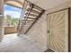 Building entrance features stairs leading to upper units, a secure door, and a covered walkway at 2606 S Durango Dr # 117, Las Vegas, NV 89117