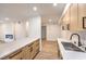Spacious open-concept kitchen with stylish cabinetry and ample counter space at 2606 S Durango Dr # 117, Las Vegas, NV 89117