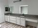 Bathroom featuring double sinks, granite countertops, and modern fixtures at 2637 Red Rock St # 202, Las Vegas, NV 89146