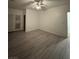 Spacious bedroom with light wood-look flooring and double door closet, great for storage at 2637 Red Rock St # 202, Las Vegas, NV 89146