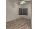 Neutral bedroom with new window and tile flooring at 2637 Red Rock St # 202, Las Vegas, NV 89146
