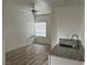 Bright kitchen area with neutral walls and ceiling fan, and a stone countertop at 2637 Red Rock St # 202, Las Vegas, NV 89146