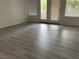 Spacious living room with neutral walls, modern floors, and abundant natural light at 2637 Red Rock St # 202, Las Vegas, NV 89146
