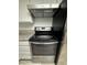Stainless steel range oven and granite countertops with white cabinets at 2637 Red Rock St # 202, Las Vegas, NV 89146