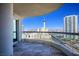 Balcony view capturing the cityscape, tall buildings, and blue skies, framed by glass railings at 2777 Paradise Rd # 1701, Las Vegas, NV 89109