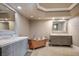 Spacious bathroom with double sinks, marble countertops, and a copper soaking tub offering luxury and comfort at 2777 Paradise Rd # 1701, Las Vegas, NV 89109