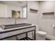 Modern bathroom featuring a unique concrete sink, marble countertop, and stylish fixtures for a spa-like experience at 2777 Paradise Rd # 1701, Las Vegas, NV 89109