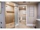 Bathroom featuring a glass-enclosed shower with tile, a toilet, and a chrome towel rack for a modern design at 2777 Paradise Rd # 1701, Las Vegas, NV 89109