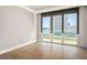Bright, neutral bedroom with large windows and access to a private balcony offering cityscape views at 2777 Paradise Rd # 1701, Las Vegas, NV 89109