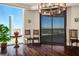 Elegant room with dark floors, city views, and decorative chandelier at 2777 Paradise Rd # 1701, Las Vegas, NV 89109