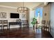 Inviting living room with dark floors, neutral colors, and a view of the city skyline at 2777 Paradise Rd # 1701, Las Vegas, NV 89109