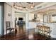 Spacious living room with open access to modern kitchen and sleek dark-stained floors at 2777 Paradise Rd # 1701, Las Vegas, NV 89109