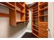 Well-organized walk-in closet with custom shelving, drawers, and ample space to store clothing and accessories at 2777 Paradise Rd # 1701, Las Vegas, NV 89109