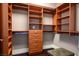 Spacious walk-in closet features custom wood shelving, drawers, and ample storage for an organized wardrobe at 2777 Paradise Rd # 1701, Las Vegas, NV 89109