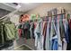 Walk-in closet with ample hanging space, shelving, and storage for clothes and accessories at 2853 Cabrillo Terrace St, Henderson, NV 89044