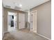 Hallway with neutral gray walls, carpet flooring, and white doors at 2853 Cabrillo Terrace St, Henderson, NV 89044