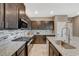 Well-equipped kitchen features granite countertops, stainless steel appliances, and a stylish backsplash at 2853 Cabrillo Terrace St, Henderson, NV 89044