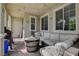 Relaxing covered patio area with comfortable seating and outdoor decor at 2853 Cabrillo Terrace St, Henderson, NV 89044