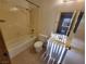 Bathroom with a bathtub, shower, and vanity with a sink at 2859 Wheelwright Dr, Las Vegas, NV 89121