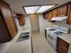 Kitchen featuring wooden cabinets, white countertops, and matching appliances at 2859 Wheelwright Dr, Las Vegas, NV 89121