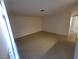 Living room features tile floors, neutral paint, and natural light at 2859 Wheelwright Dr, Las Vegas, NV 89121