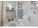 Bathroom featuring a vanity, toilet, walk-in closet, and tiled walls at 2910 Raywood Ash Dr, Las Vegas, NV 89138