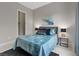 Comfortable bedroom featuring artwork, stylish decor, and a walk-in closet at 2910 Raywood Ash Dr, Las Vegas, NV 89138