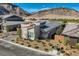 Lovely single-story home with desert landscaping, a gray roof, and great curb appeal at 2910 Raywood Ash Dr, Las Vegas, NV 89138