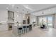 Beautiful, modern kitchen with stainless steel appliances, island, and breakfast bar seating at 2910 Raywood Ash Dr, Las Vegas, NV 89138