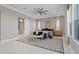 Relaxing main bedroom with sliding barn door, stylish furniture and lots of natural light at 2910 Raywood Ash Dr, Las Vegas, NV 89138