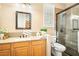 Bright bathroom with granite countertop, updated fixtures, and a glass-enclosed shower, offering a modern aesthetic at 2964 Via Della Amore, Henderson, NV 89052