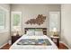 Bedroom with a large bed and lots of natural light from the windows at 2964 Via Della Amore, Henderson, NV 89052