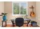 Office space with shutters, hardwood floors and glass desk at 2964 Via Della Amore, Henderson, NV 89052